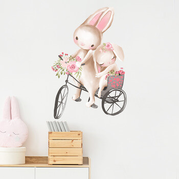 Autocolant pentru camera copilului Bunnies on a Bike - 60x30 cm